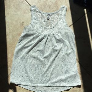 Cream and black speckled top